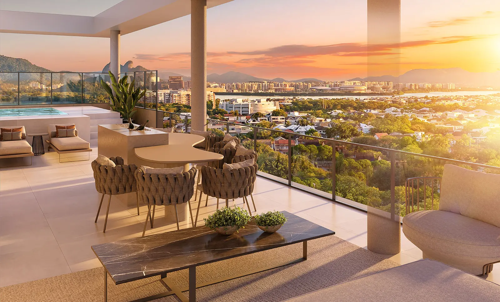 Perspectiva do terraço de uma cobertura linear, com mesa e vista para a Barra