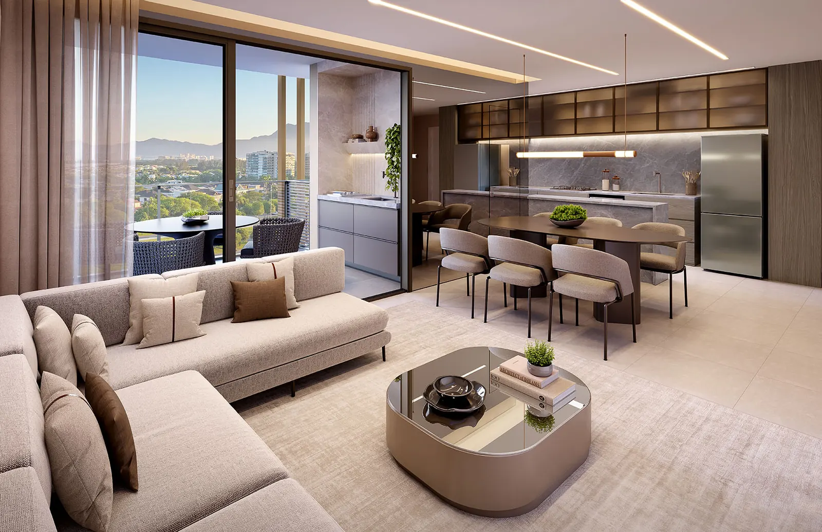 Perspectiva da sala integrada à cozinha e à varanda num apartamento de 3 suítes