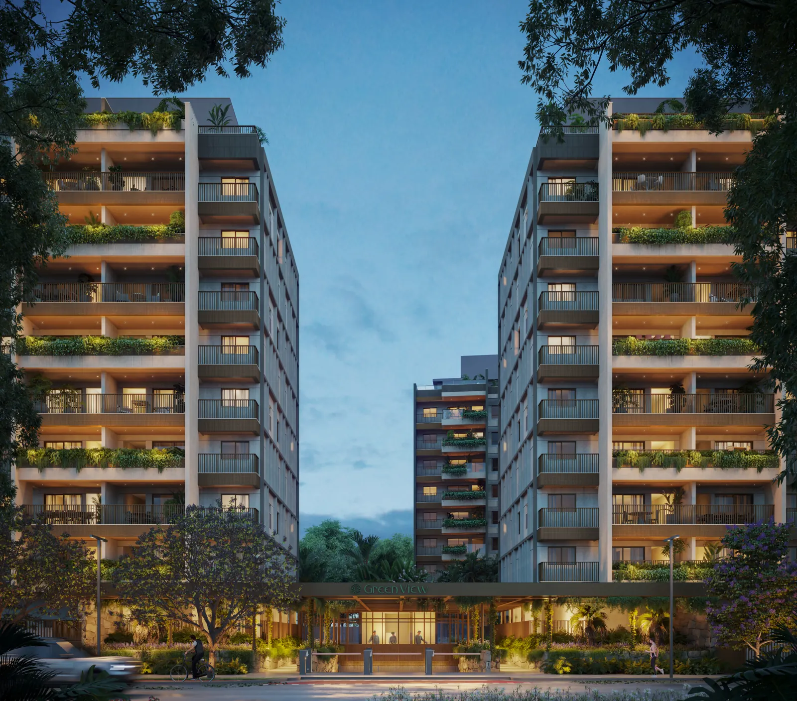 Fachadas das Torres 3 e 5 do Green View ao entardecer, com o térreo iluminado