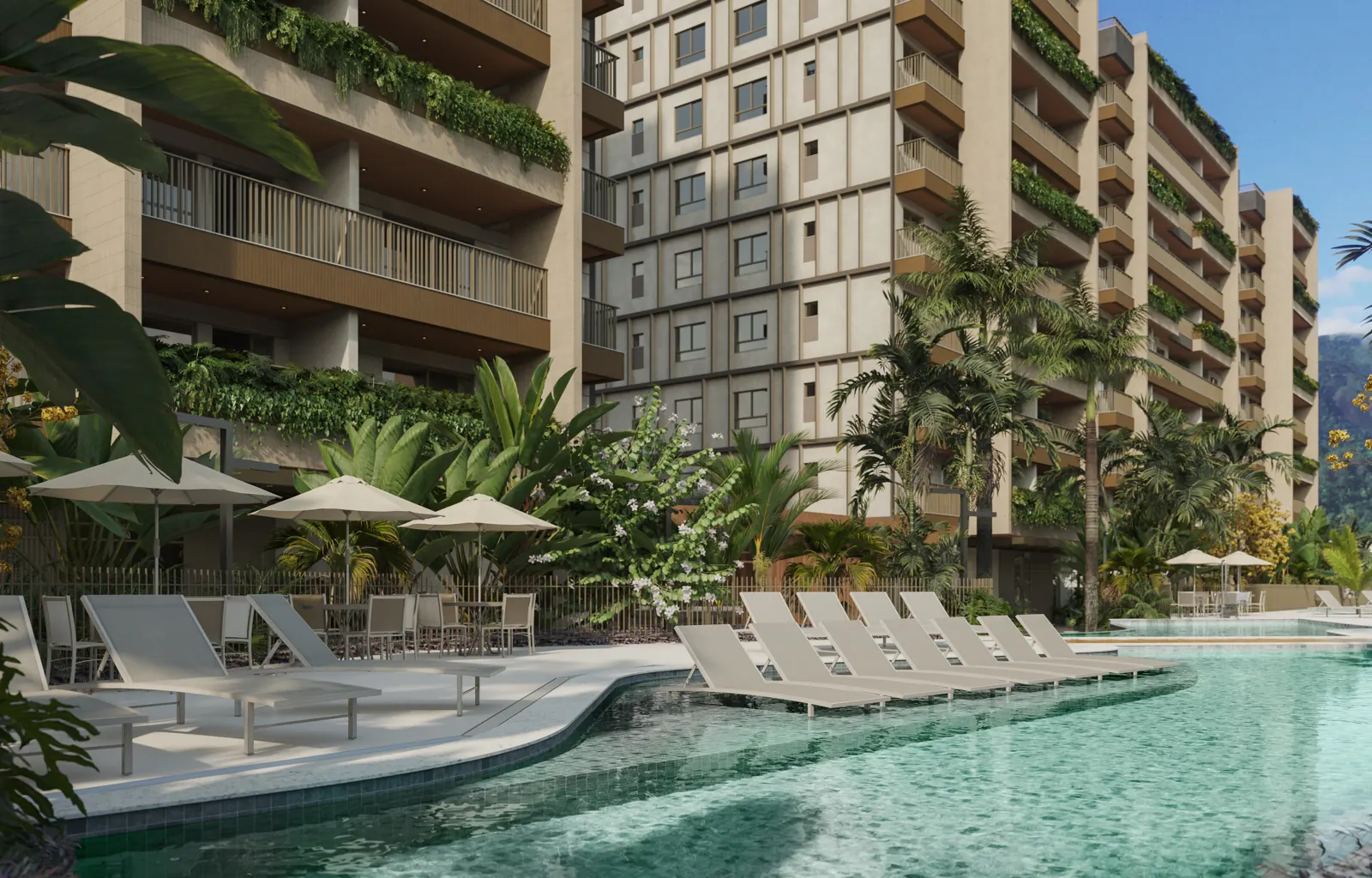 Piscina adulto com deck molhado e espreguiçadeiras, com as torres ao fundo