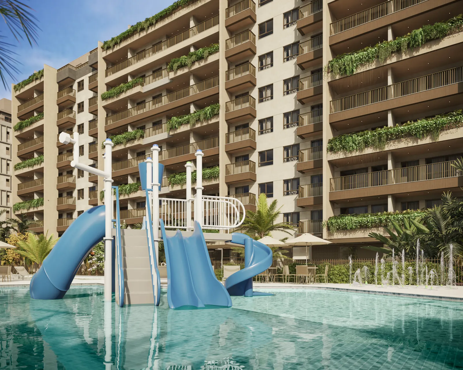 Piscina infantil com toboáguas e as torres ao fundo
