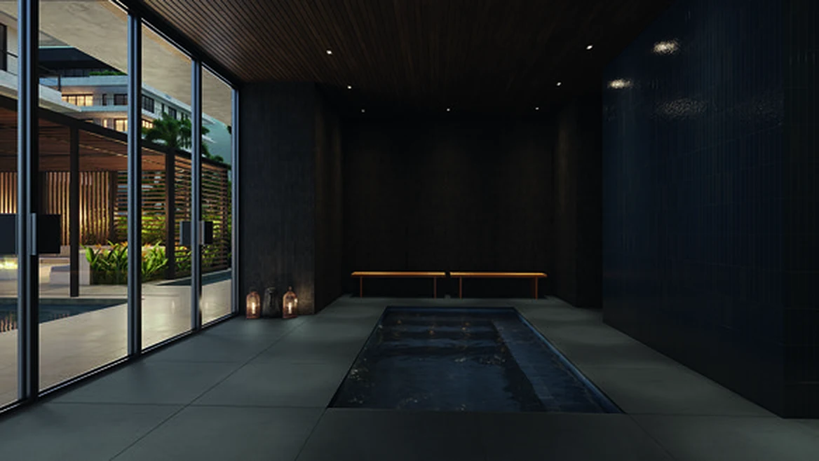 Hidromassagem coberta do spa, em ambiente escuro com velas