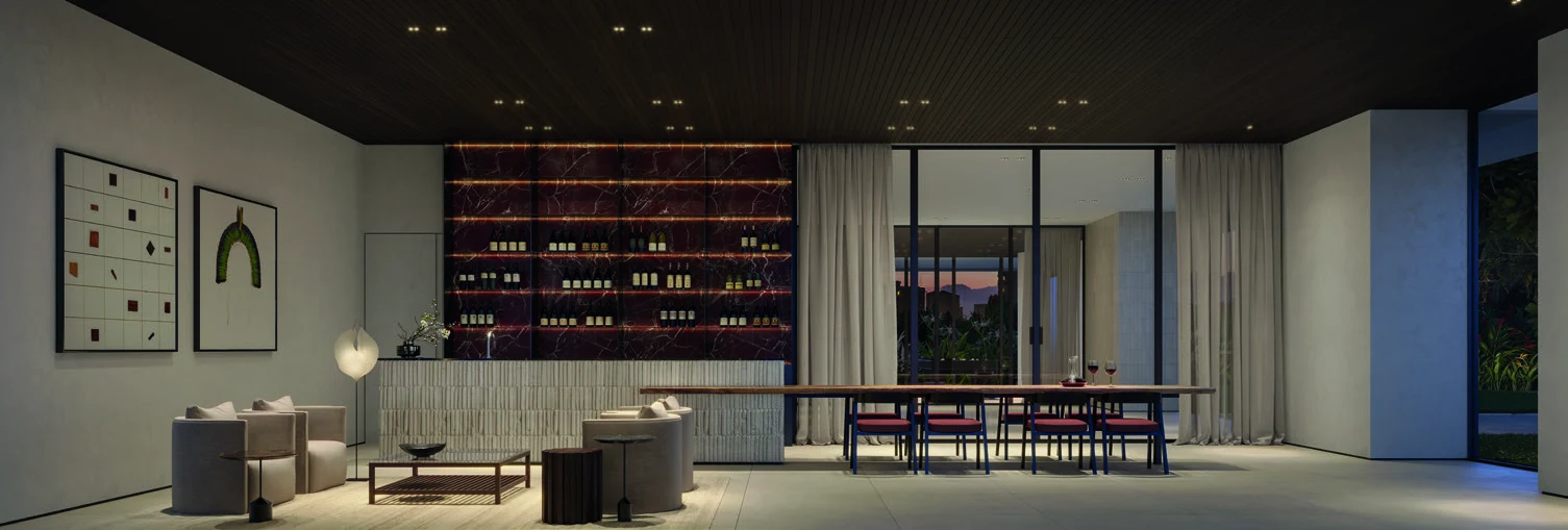 Wine bar com adega iluminada, mesa comprida e poltronas